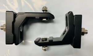 Adjustable mounting legs for curved lightbars